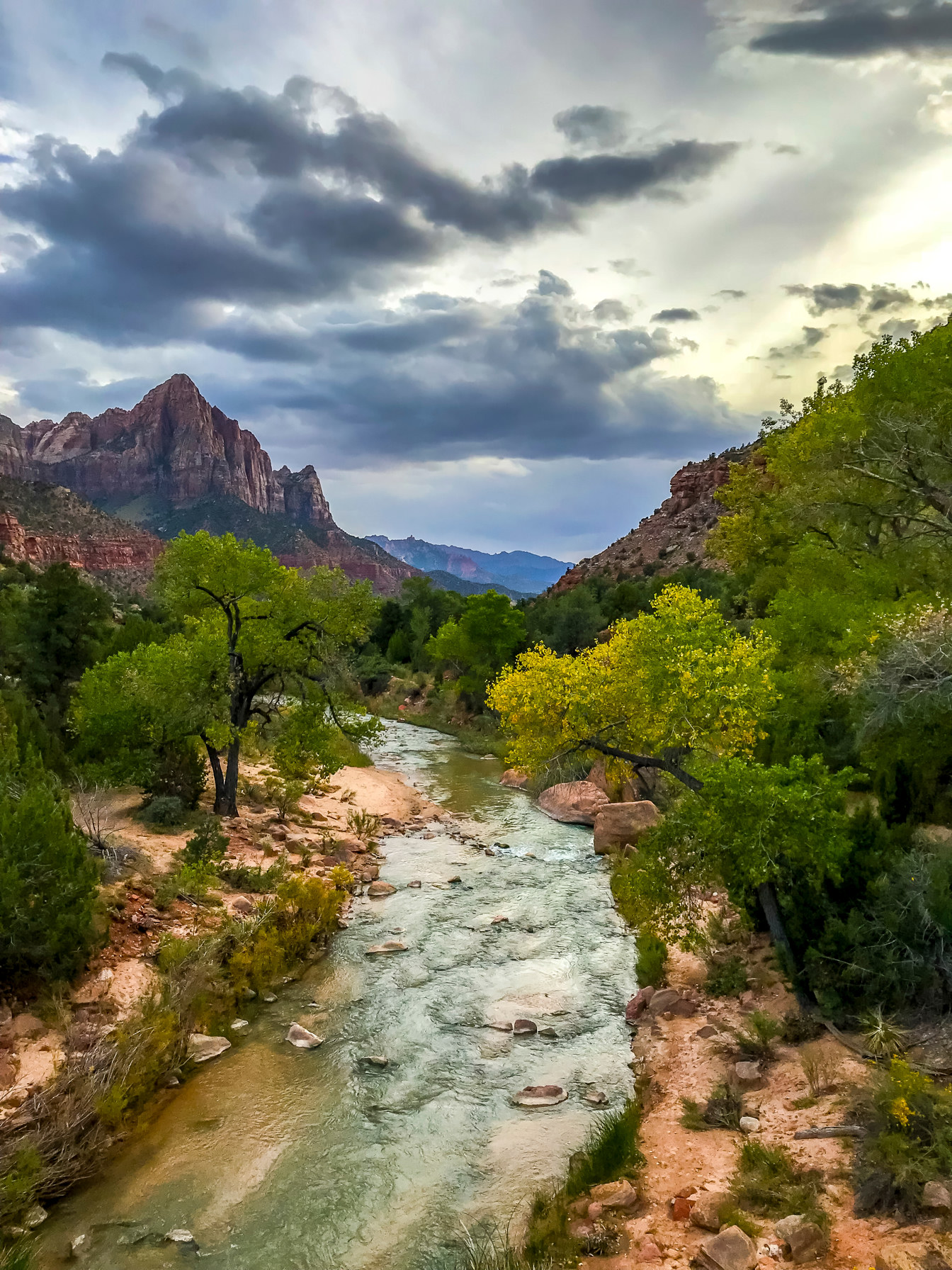 A river through a Utah canyon under storm light.
